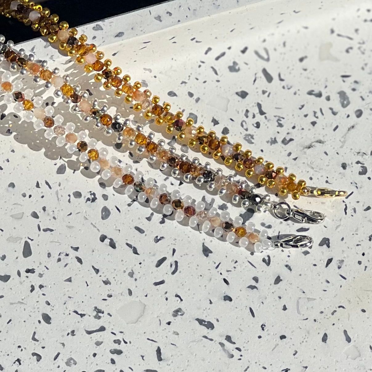 Elegant Double-Strand White and Amber Bead Bracelet