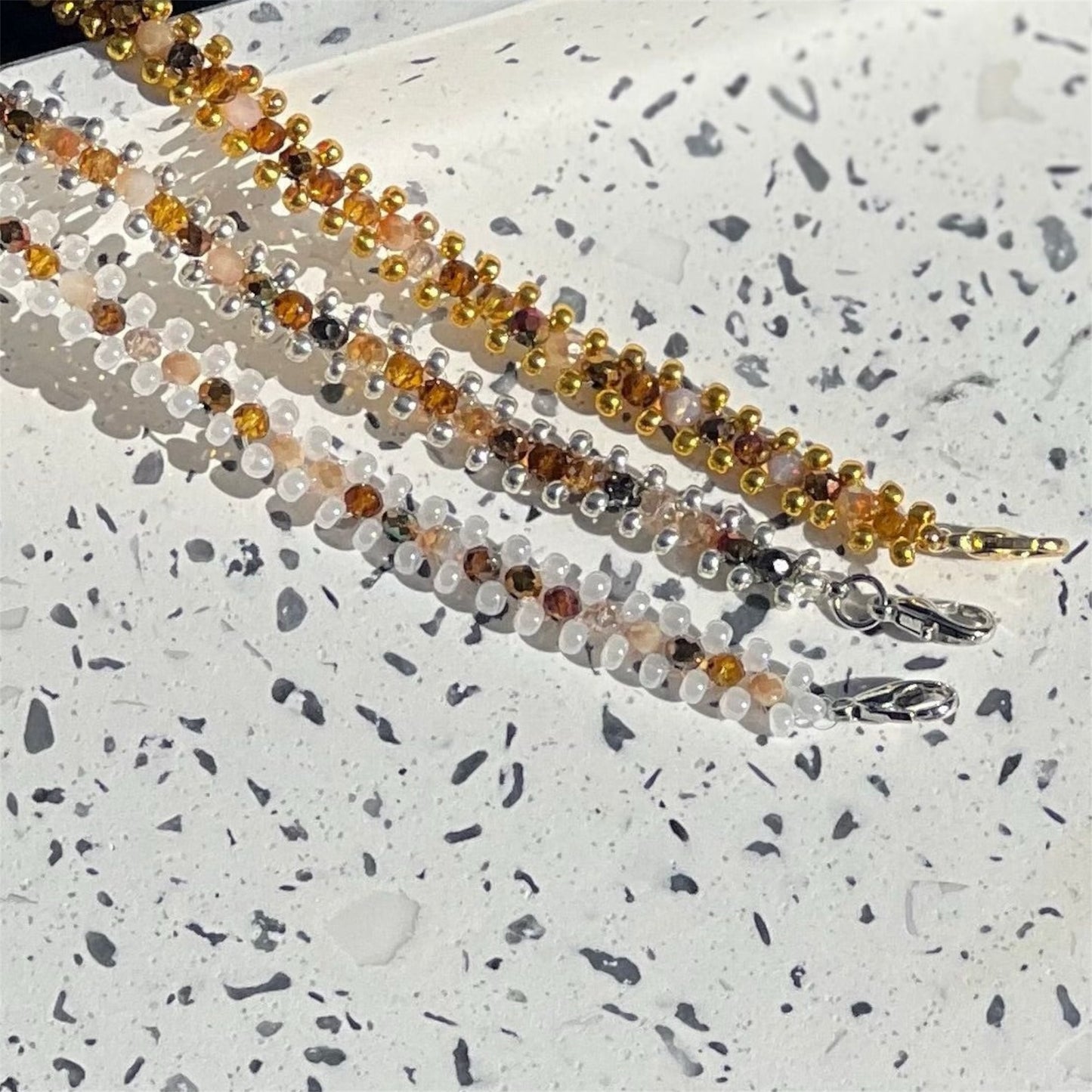 Elegant Double-Strand White and Amber Bead Bracelet